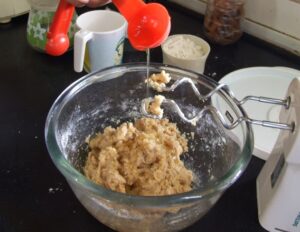 Add oil to bread mix