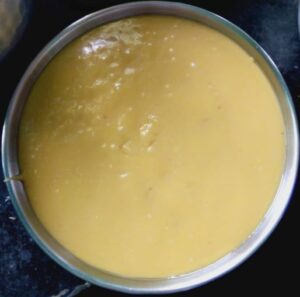 Spreading Mysore pak mixture